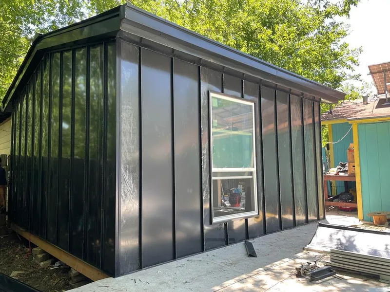 Black standing seam metal wall panels for Metal Roof Installation in Hillsboro